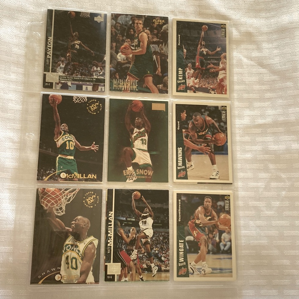 Vintage Collection of Seattle Supersonic NBA trading cards near mint condition
